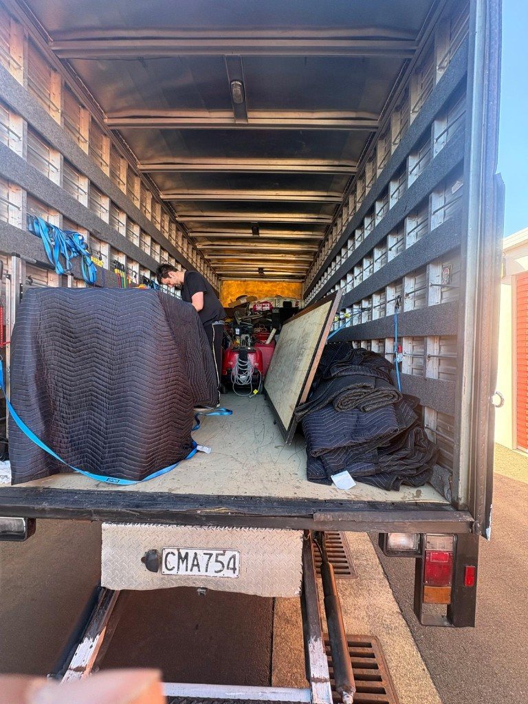Truck loaded with blankets and straps